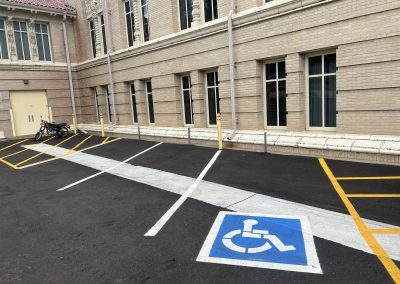 Parking area striping near a downtown building
